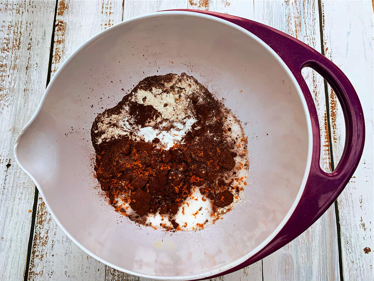 Mixing bowl with flour, caster sugar, cocoa powder.