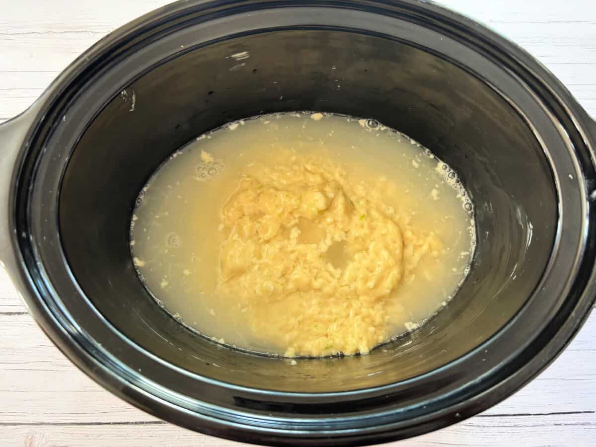Cake batter with sauce poured over.