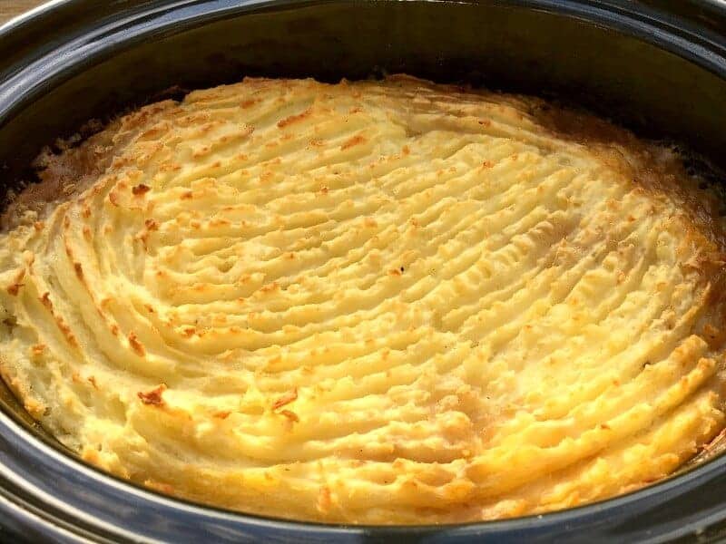 Close up of shepherds pie in slow cooker.