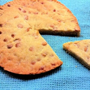 White chocolate shortbread with a slice cut out.