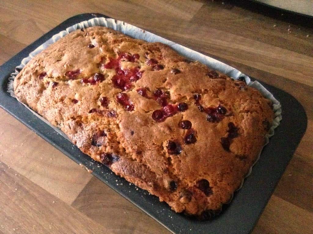 Loaf cake in a baking tin, after baking.