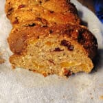 Braided loaf with fruit filling sliced open to show the inside.