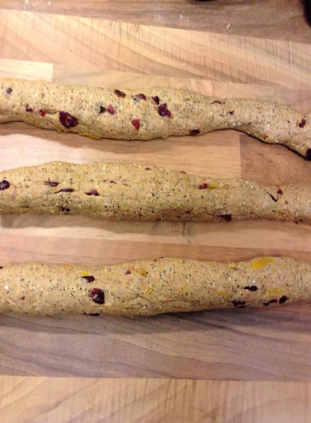 Three thin strands of dough.