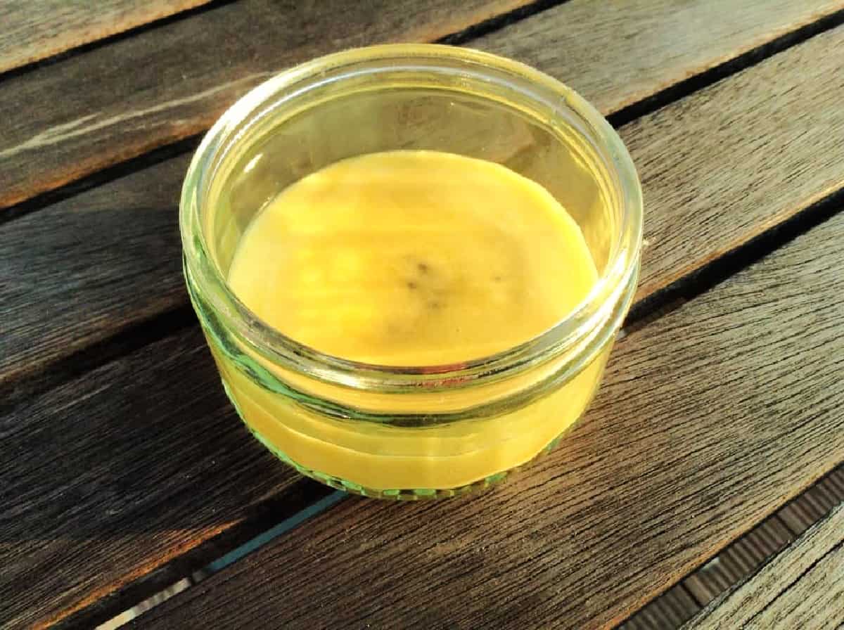 Glass pot of kiwi satsuma curd.