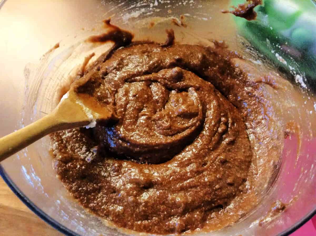 Friand mixture in a bowl, looking glossy.