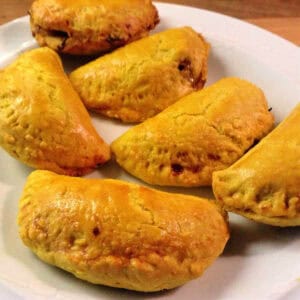Plate of jerk chicken patties.