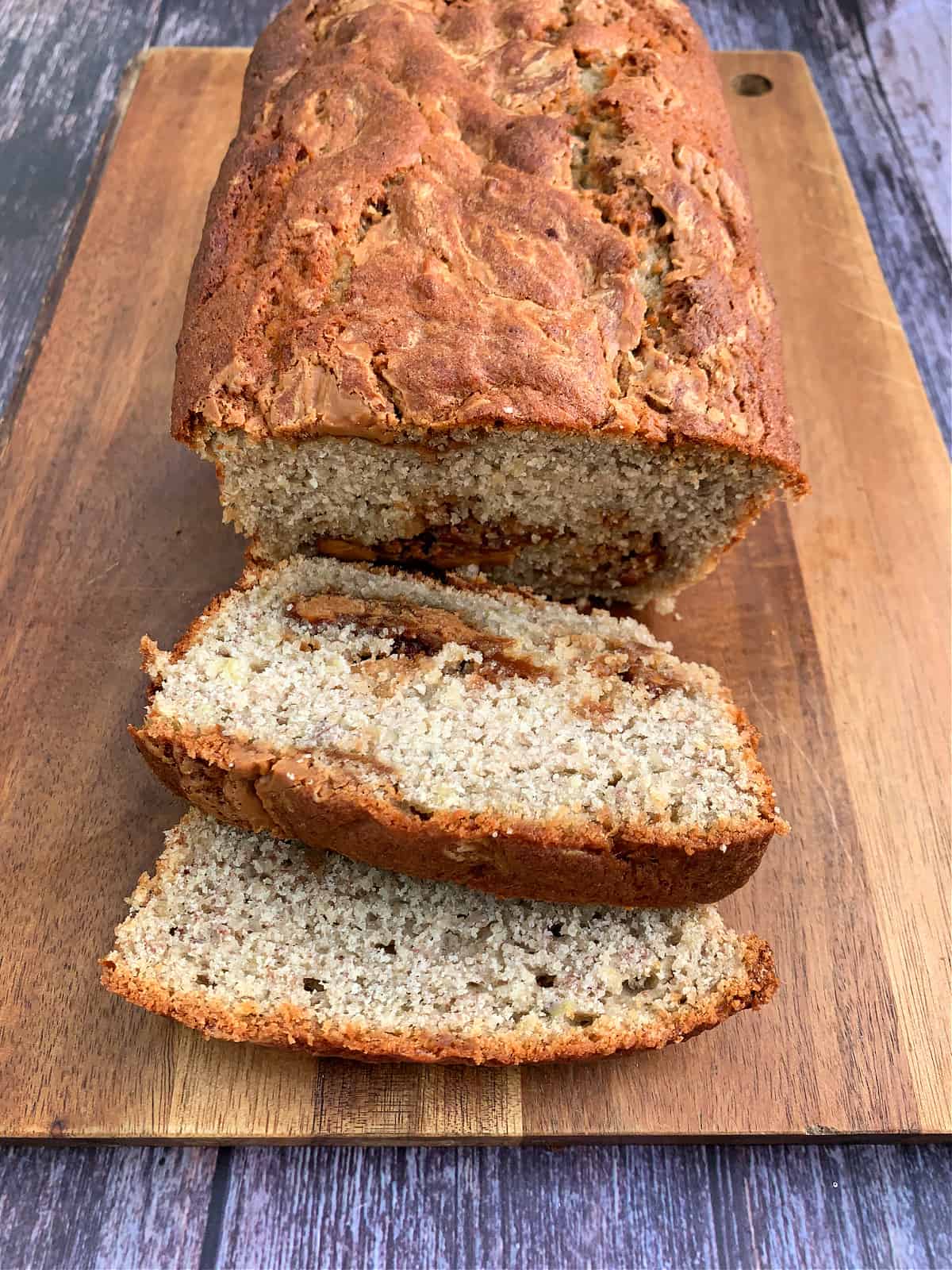 Banana bread with swirls of biscoff spread inside.