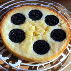 Blondies with Oreos sunk in, on a cooling rack.