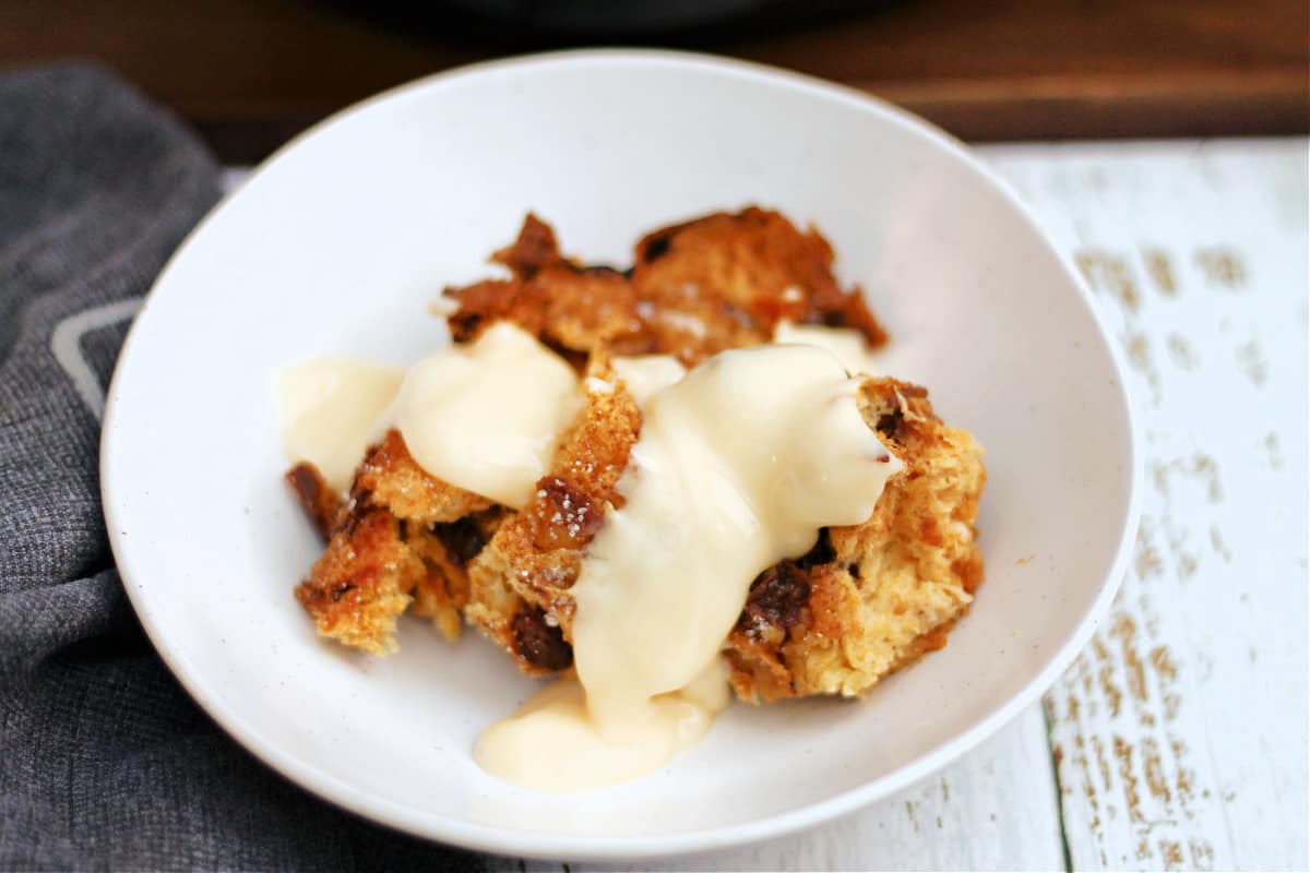 Bowl of panettone French toast with custard.