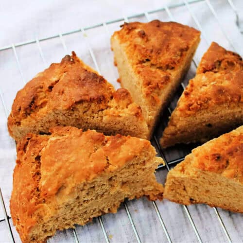 Caramel scones on a metal cooling rack.