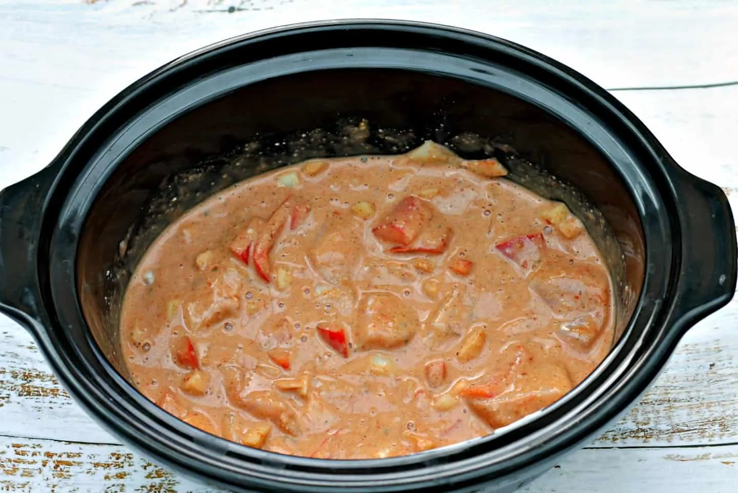 Curry in slow cooker pot.