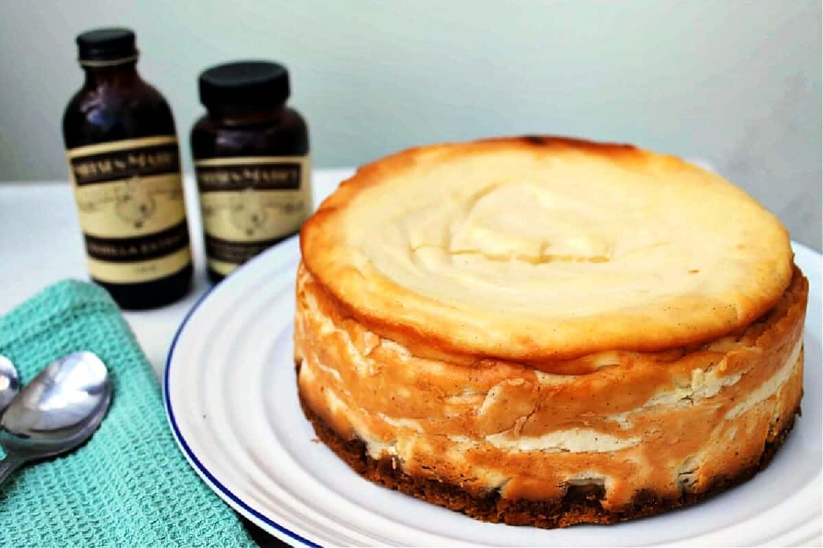 Cheesecake on a white plate.