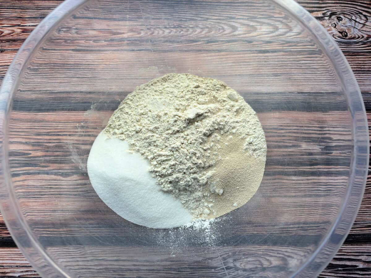 Flour, sugar and yeast in a bowl.