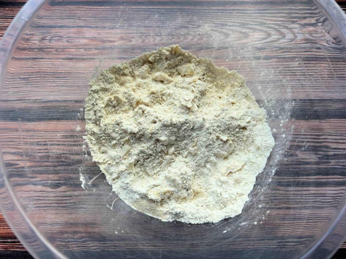 Butter rubbed into dough ingredients.