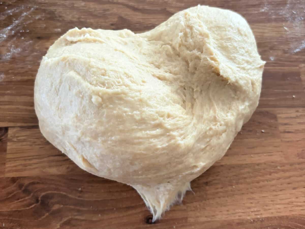 Soft dough after mixing together, before kneading.