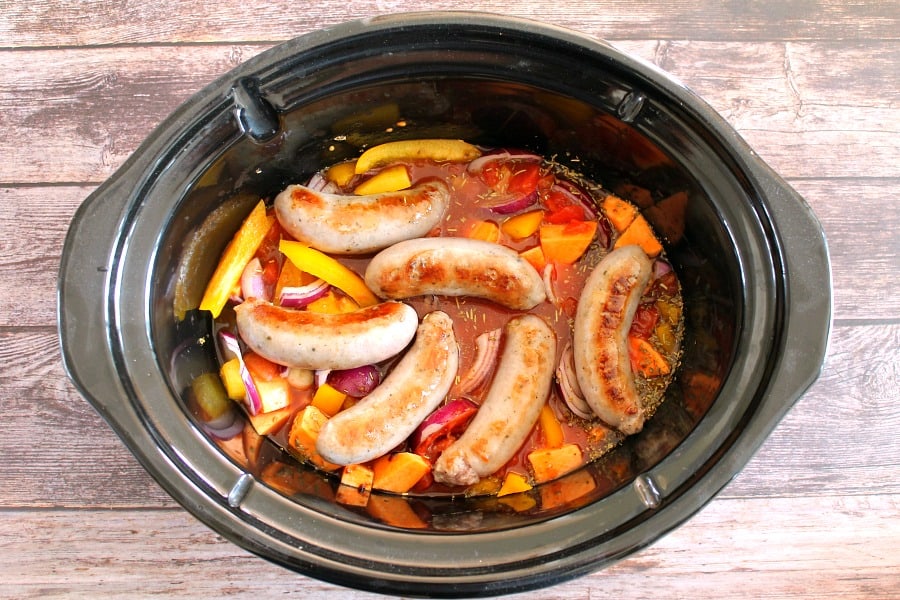 Sausage casserole ingredients in slow cooker.