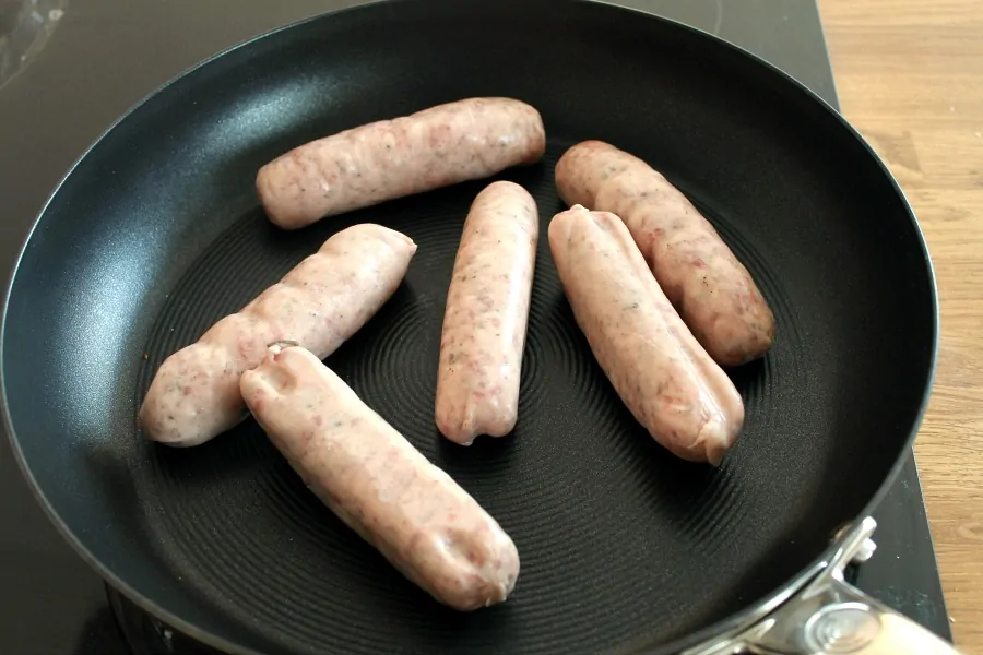 Sausages in a saucepan.