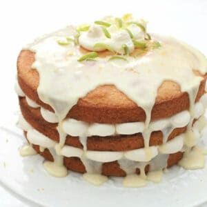 Three layer cake with drizzled icing.