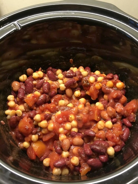 Beans in slow cooker pot for bean stew.