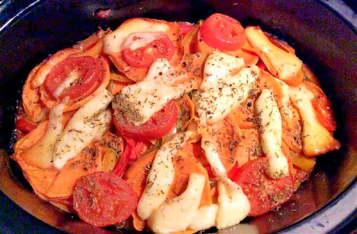 Halloumi sweet potato and pepper bake in slow cooker pot.