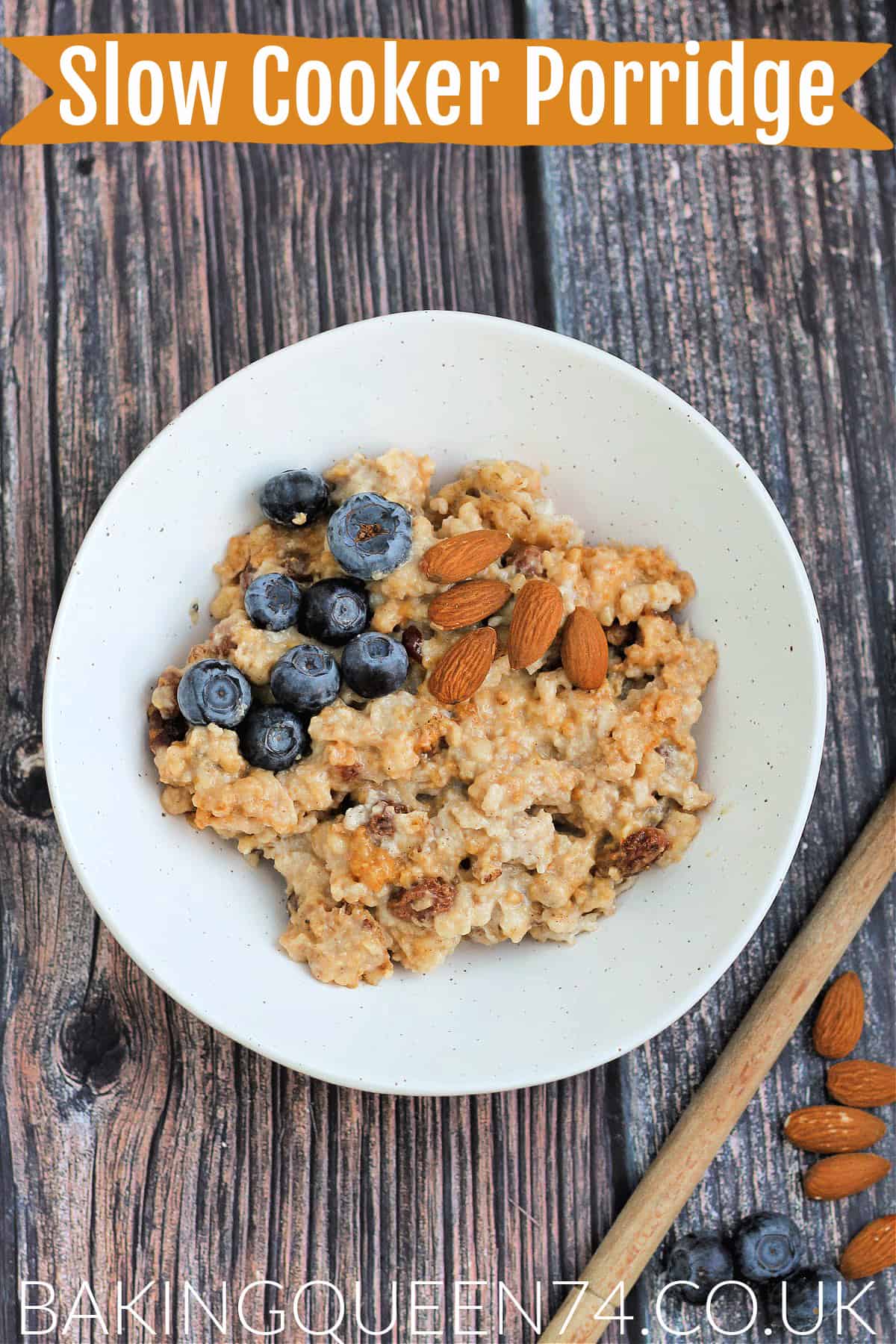 White bowl of porridge on a wooden background with text overlay 'slow cooker porridge'.