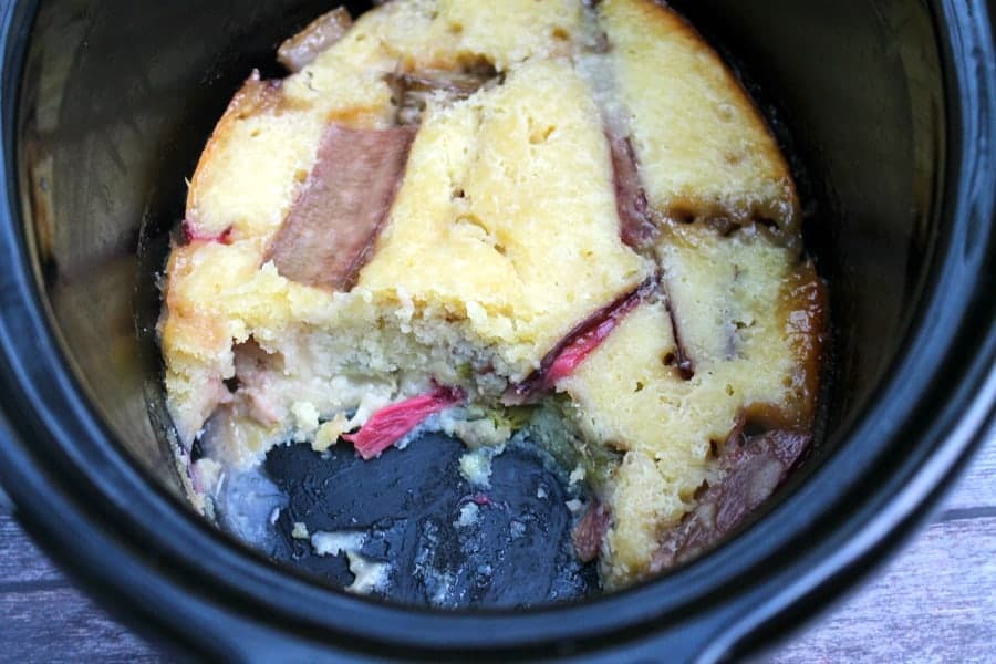 Slow cooker rhubarb cobbler with a serving removed