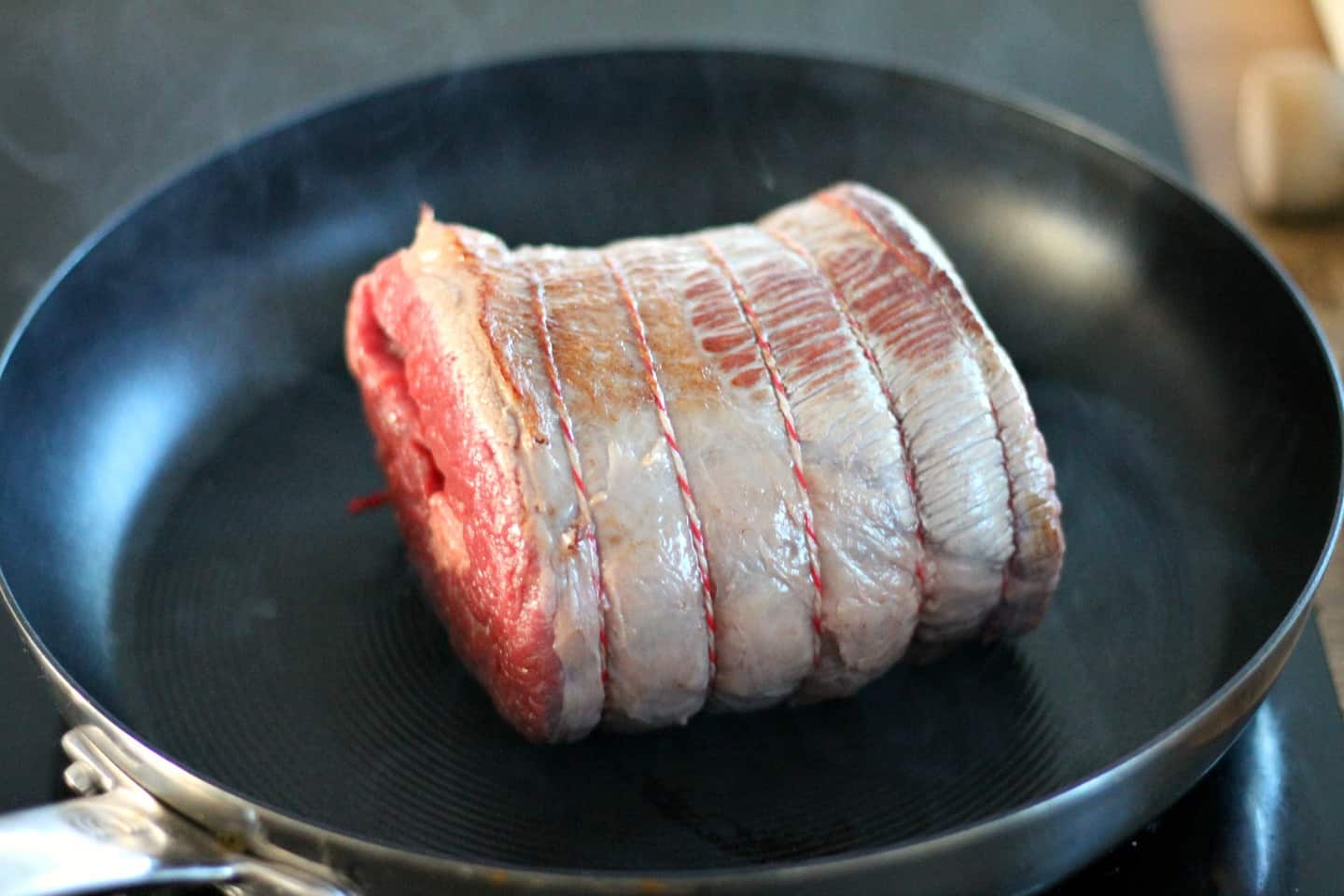 Brisket in a frying pan.