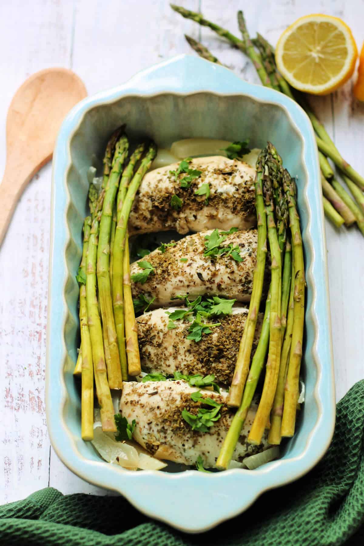 Chicken and asparagus in a serving dish.