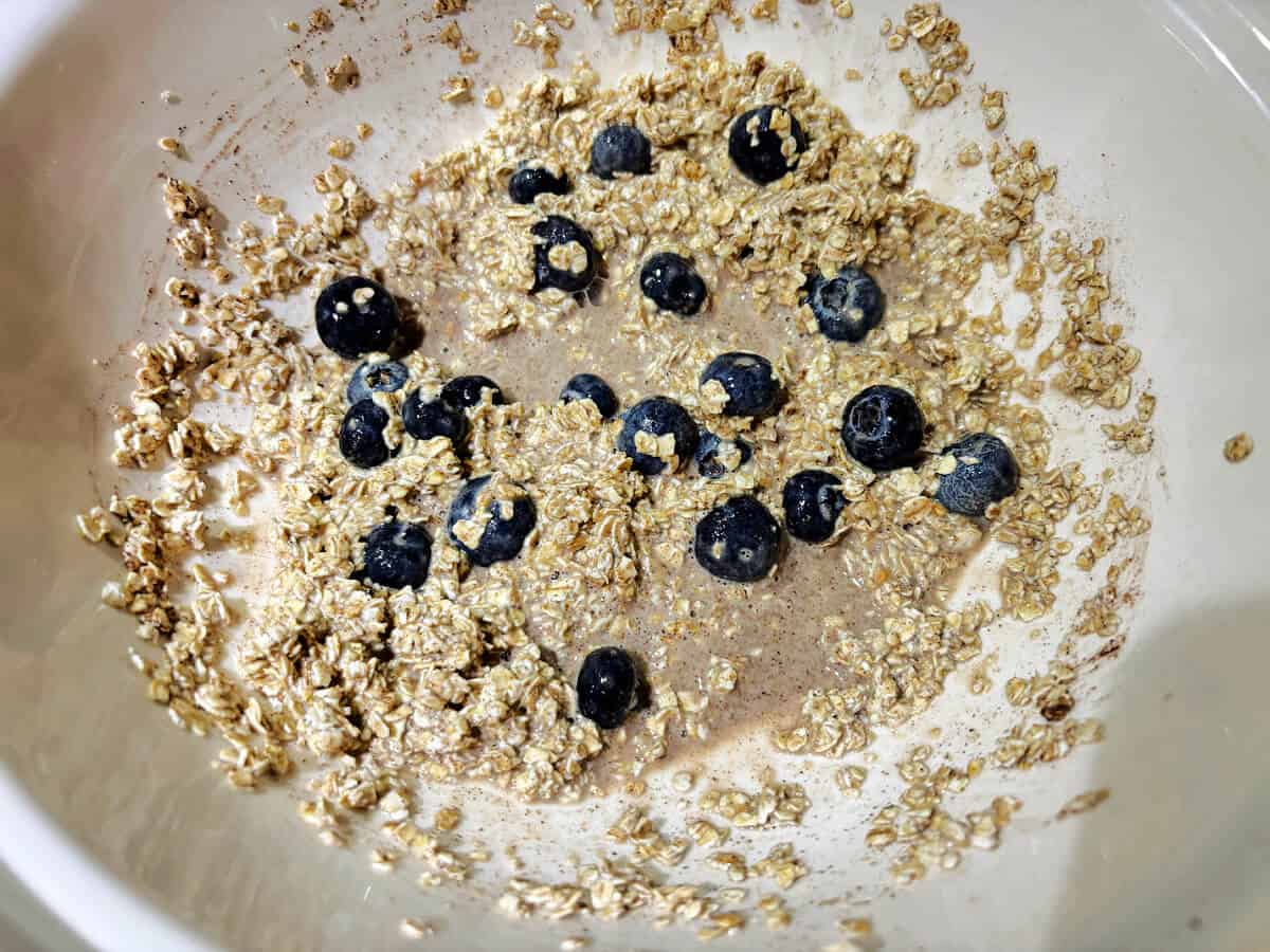 Baked oat mixture with blueberries added.
