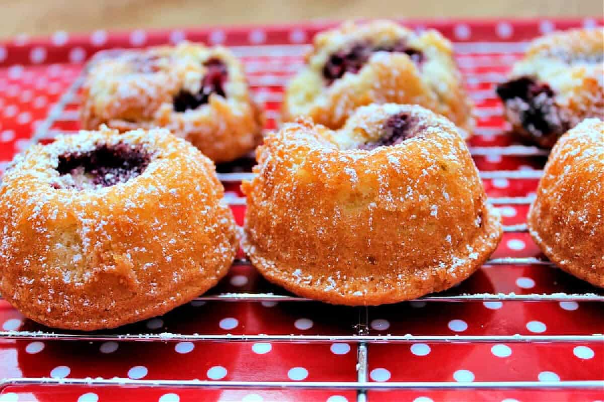 Close up of pretty little bundt cakes on a cooling rack