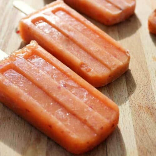 Orange papaya popsicles.