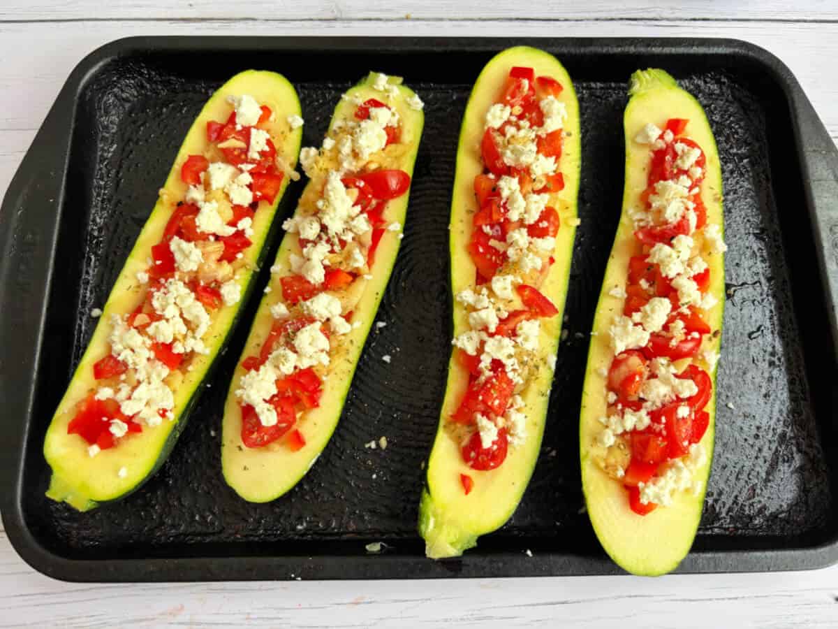 Stuffed courgettes ready to bake.