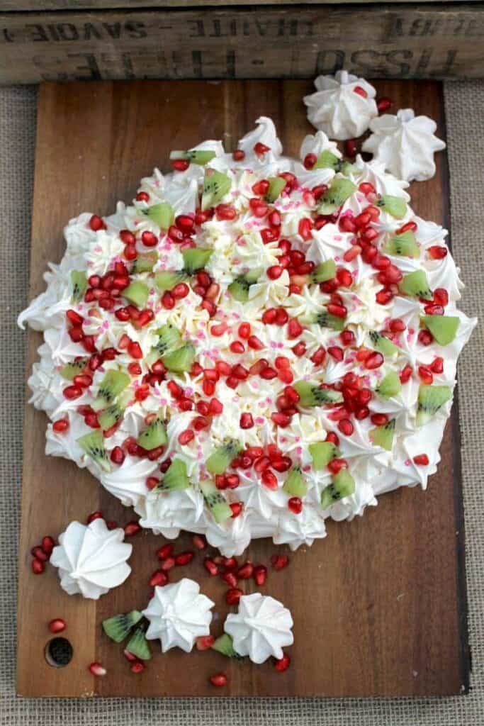 Pomegranate and kiwi crown pavlova