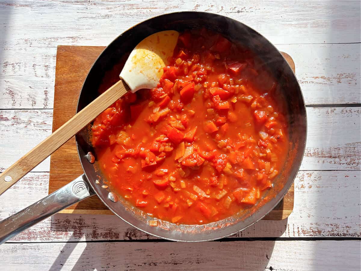 Cooked tomato sauce in a frying pan.