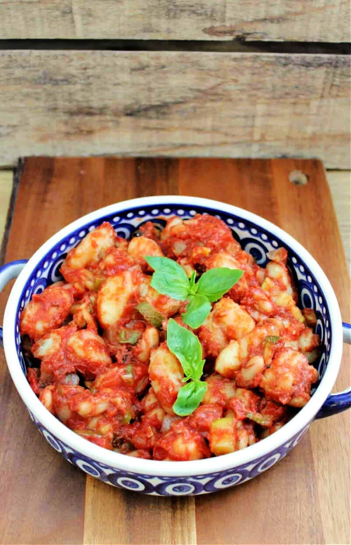 Slow cooker gnocchi with cannellini beans.