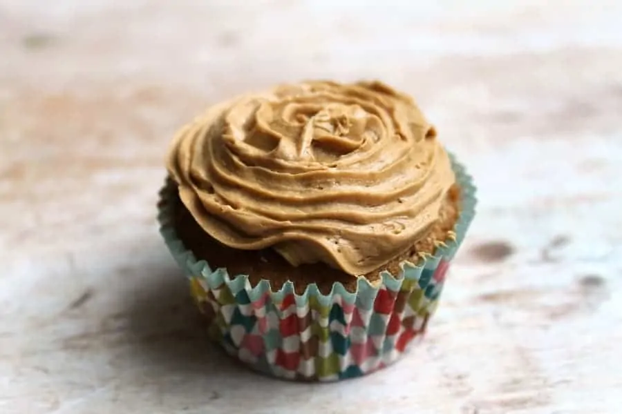 Close up of a single cupcake with icing.