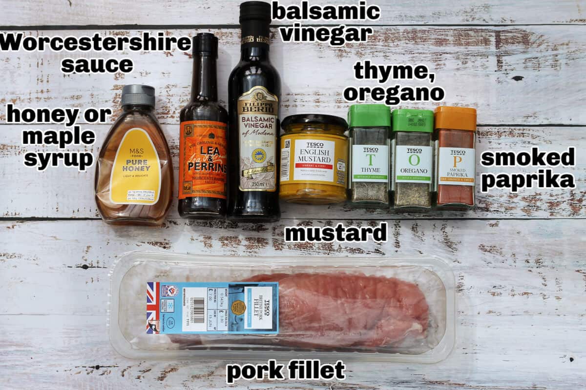 Labelled ingredients on white table.