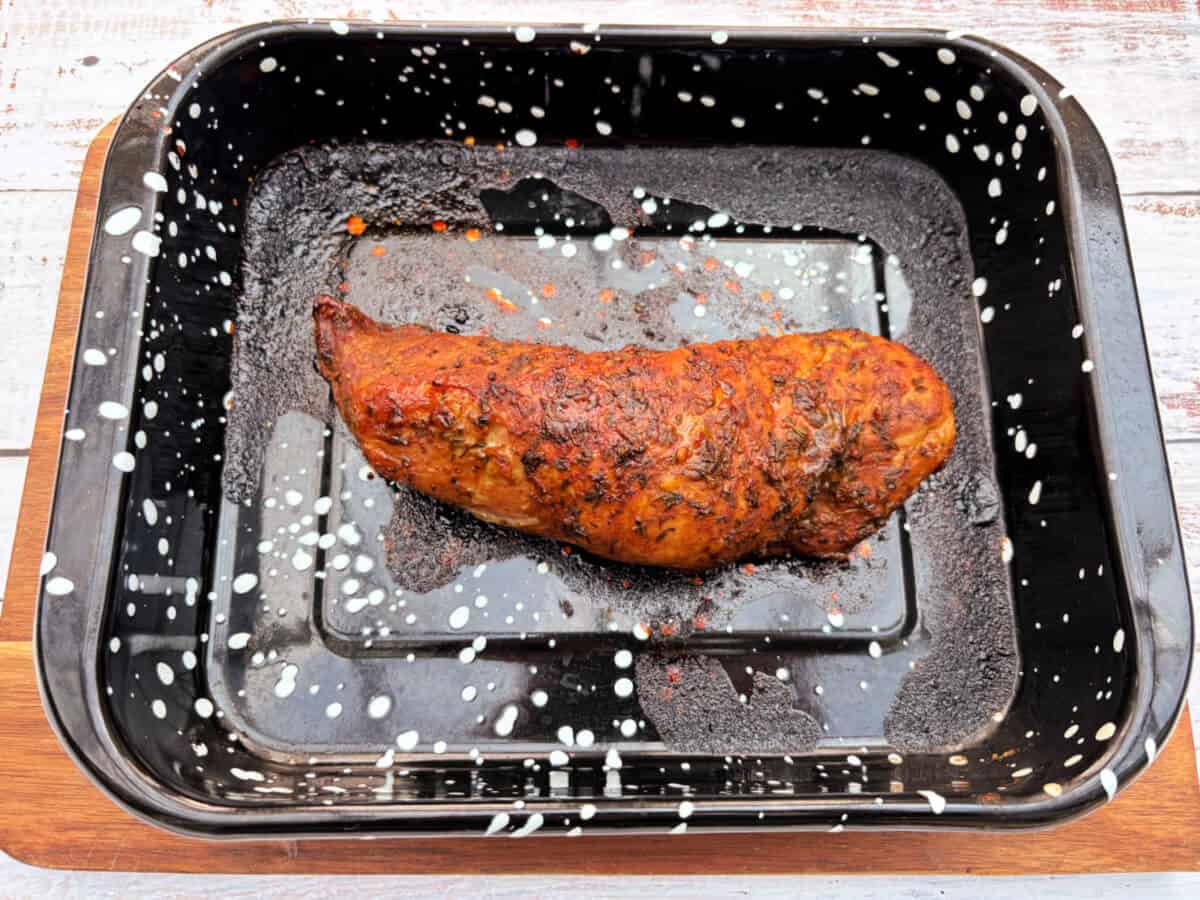 Pork fillet in an oven tray.