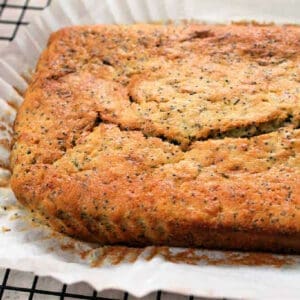 Close up of loaf cake with crack in the top after baking.