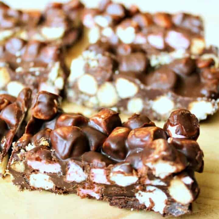 Slices of rocky road, showing the marshmallows and biscuit inside.