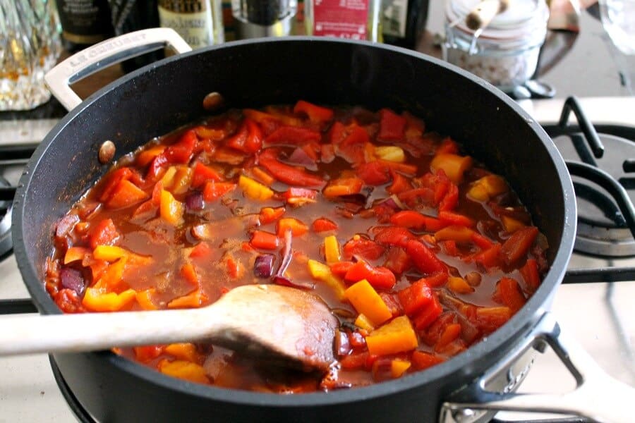 Making the goulash sauce in a frying pan for paprika pork goulash