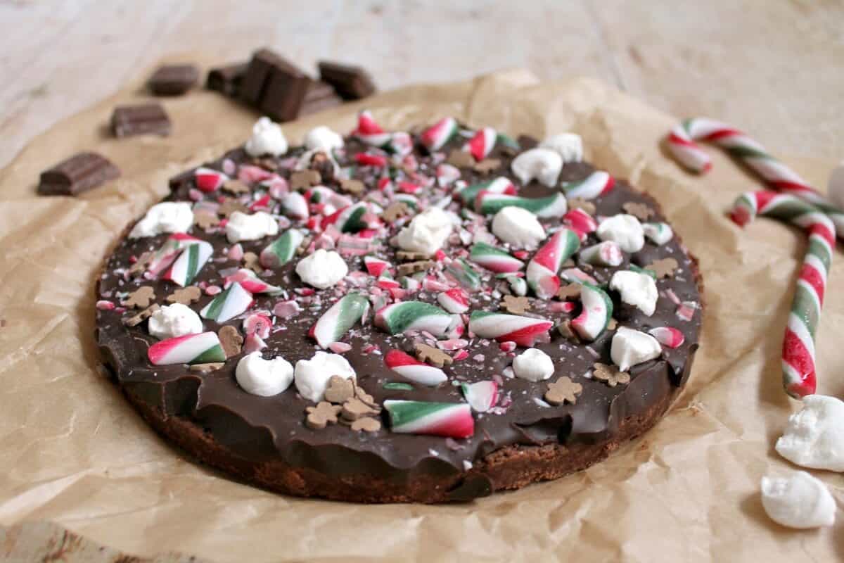 Christmas chocolate shortbread with candy canes, on baking paper