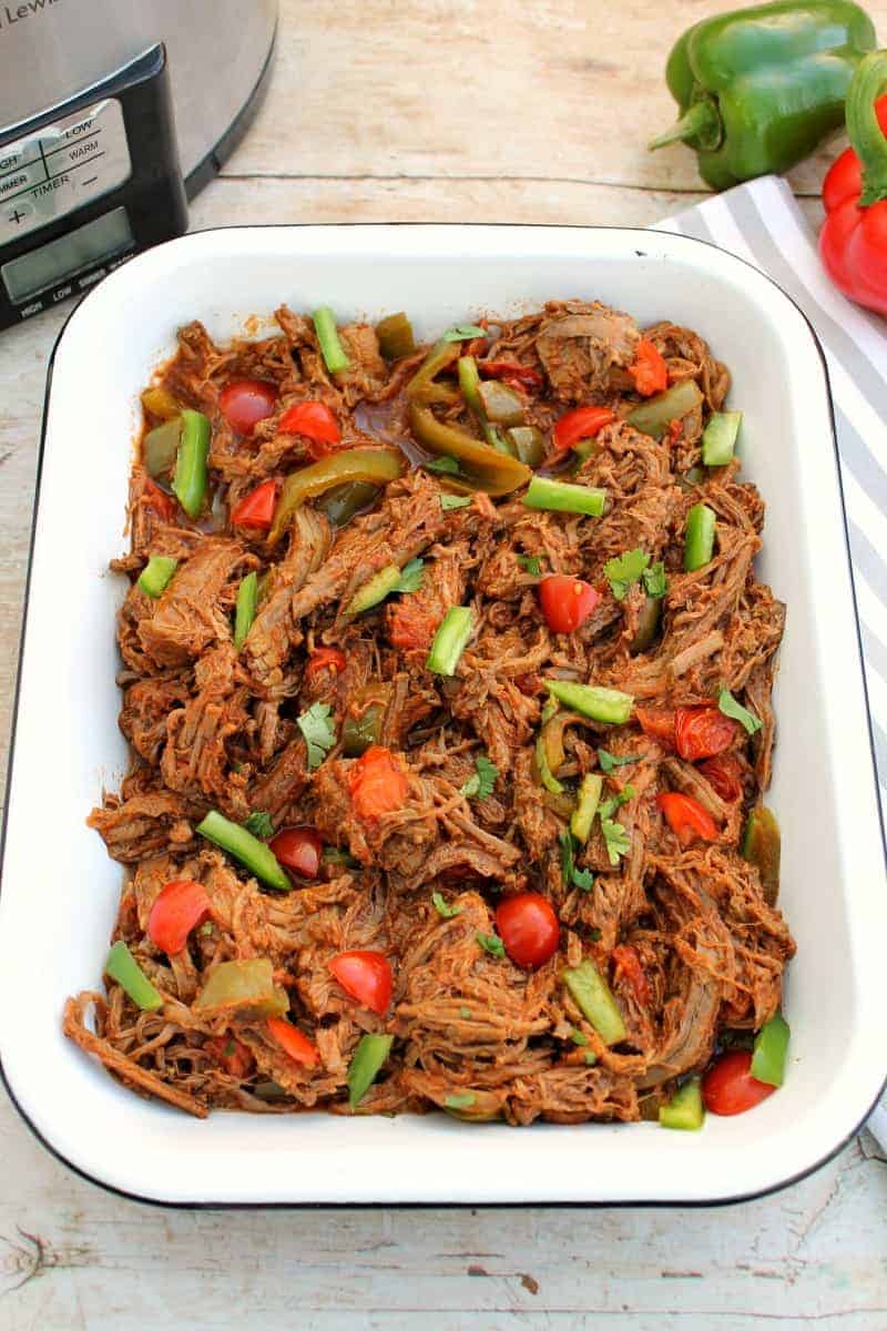 Pulled beef in a white serving dish.