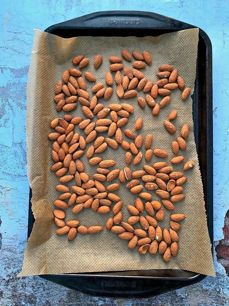Almonds on a baking tray.