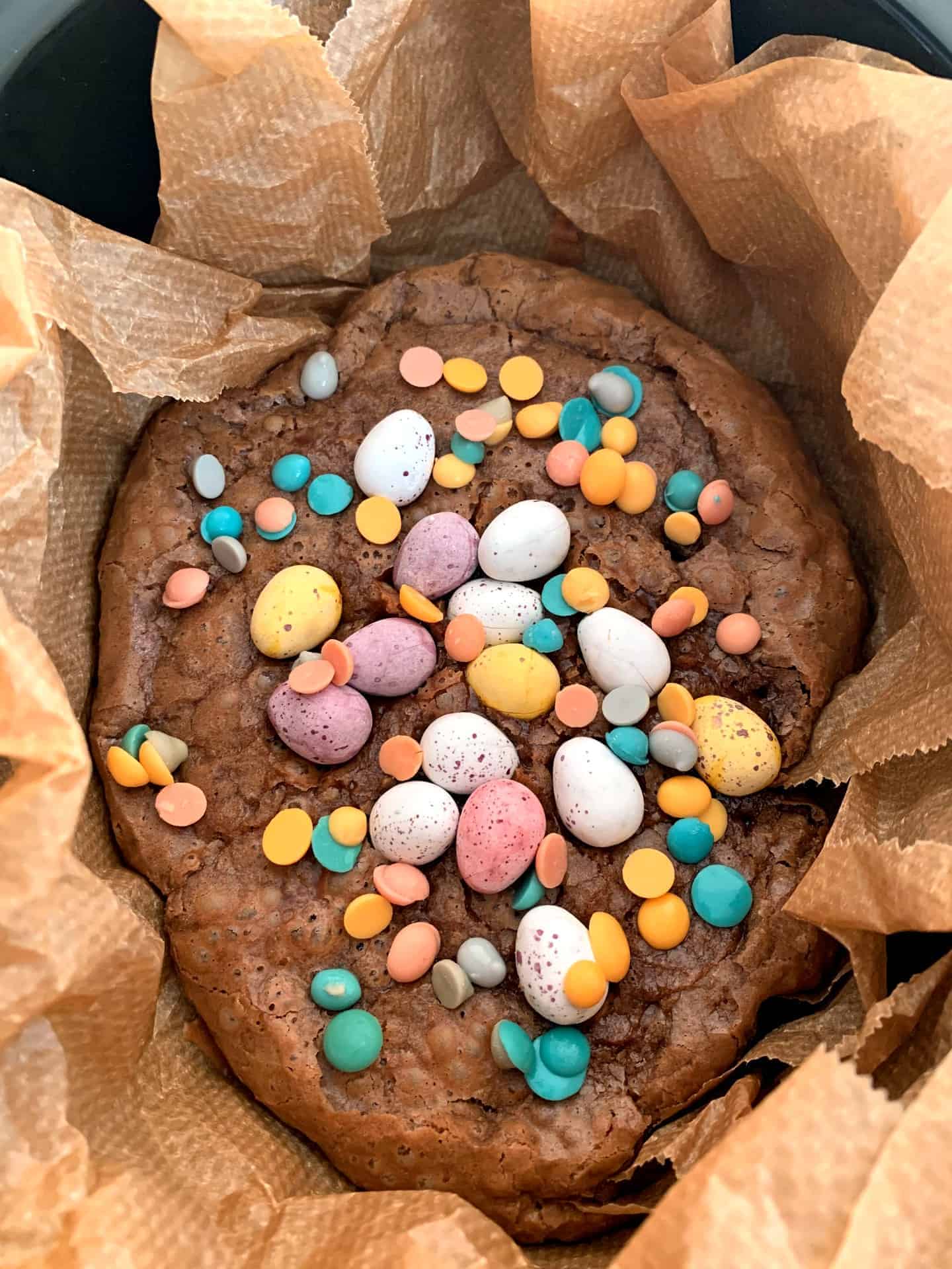 Brownies with Mini eggs in a slow cooker pot.