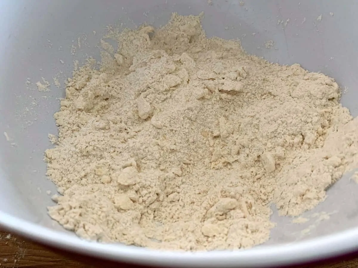 Bowl containing flour with butter rubbed in.