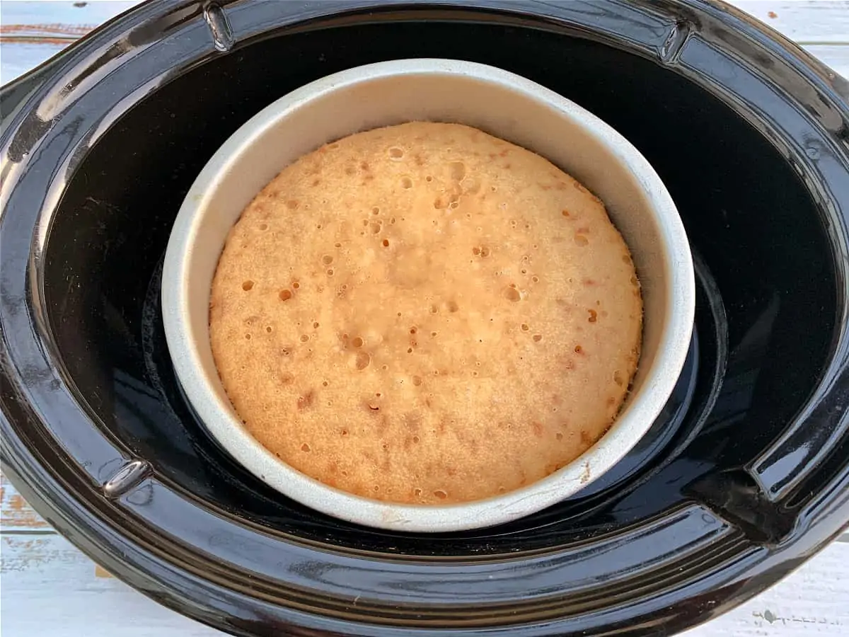Cake baked in a tin in a slow cooker.