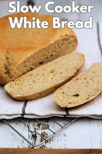 Image of sliced white bread with text overlay reading "slow cooker white bread".