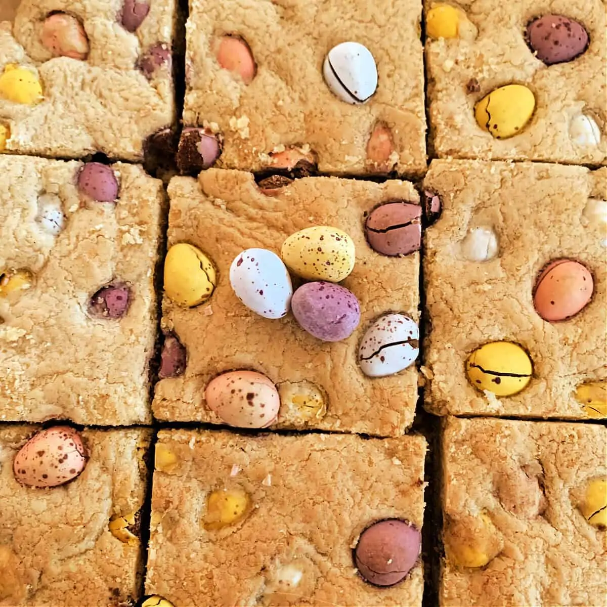 Cookie bar squares with Cadbury Mini Eggs on top;