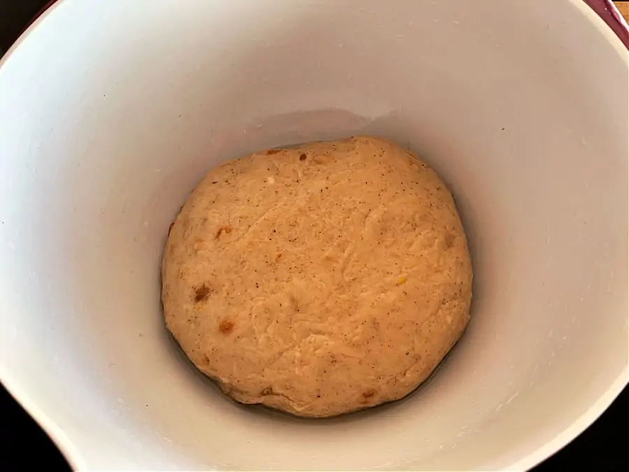 Hot cross bun dough in a bowl ready for first rise.